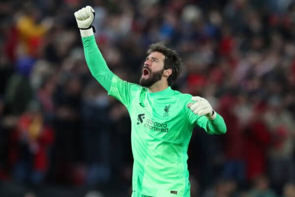 LIVERPOOL, ENGLAND - APRIL 27: Alisson Becker of Liverpool celebrates their team's second goal during the UEFA Champions League Semi Final Leg One match between Liverpool and Villarreal at Anfield on April 27, 2022 in Liverpool, England. (PUEFA)