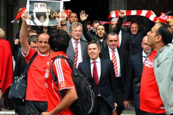 Martin Broughton, centre, managing director Christian Purslow, front centre, and Ian Ayre, right, pushed through the sale of Liverpool in 2010 after a High Court battle (Fiona Hanson/PA)