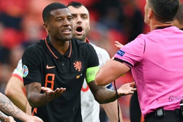 AMSTERDAM, NETHERLANDS - JUNE 21: Aleksandar Trajkovski of North Macedonia and Georginio Wijnaldum of Netherlands react towards Match Referee, Istvan Kovacs during the UEFA Euro 2020 Championship Group C match between North Macedonia and The Netherlands at Johan Cruijff Arena on June 21, 2021 in Amsterdam, Netherlands. (Photo by Lukas Schulze - UEFA)