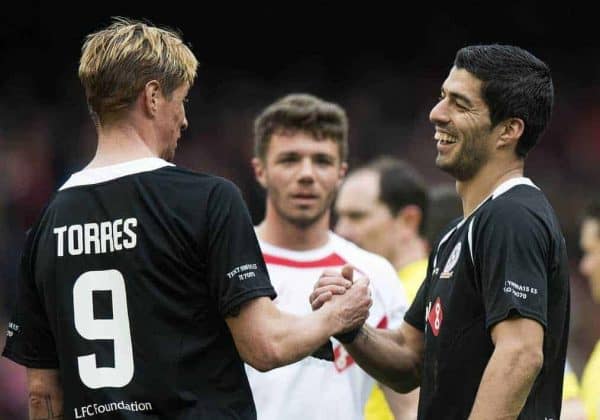 LIVERPOOL, ENGLAND - Sunday, March 29, 2015: Luis Suarez and Fernando Torres shake hands at the end of the Liverpool All Star Charity match at Anfield. (Pic by Richard Martin-Roberts/Propaganda)