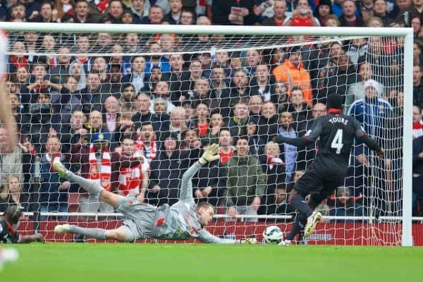 LONDON, ENGLAND - Saturday, April 4, 2015: Liverpool's goalkeeper Simon Mignolet makes a save against Arsenal during the Premier League match at the Emirates Stadium. (Pic by Chris Brunskill/Propaganda)