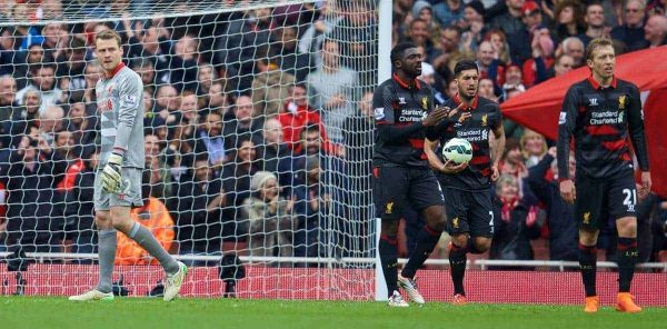 LONDON, ENGLAND - Saturday, April 4, 2015: Liverpool's goalkeeper Simon Mignolet looks dejected as Arsenal score the opening goal during the Premier League match at the Emirates Stadium. (Pic by David Rawcliffe/Propaganda)