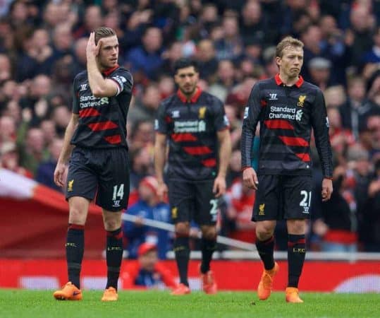 LONDON, ENGLAND - Saturday, April 4, 2015: Liverpool's captain Jordan Henderson looks dejected as Arsenal score the third goal before half-time during the Premier League match at the Emirates Stadium. (Pic by David Rawcliffe/Propaganda)