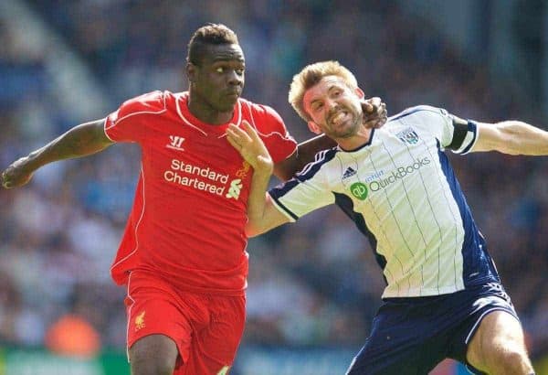 WEST BROMWICH, ENGLAND - Saturday, April 25, 2015: Liverpool's Mario Balotelli in action against West Bromwich Albion's Gareth McAuley during the Premier League match at the Hawthorns. (Pic by David Rawcliffe/Propaganda)