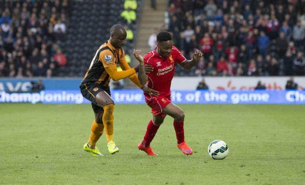 KINGSTON-UPON-HULL, ENGLAND - Tuesday, April 28, 2015: Liverpool's Raheem Sterling in action against Hull City's Sone Aluko during the Premier League match at the KC Stadium. (Pic by Gareth Jones/Propaganda)