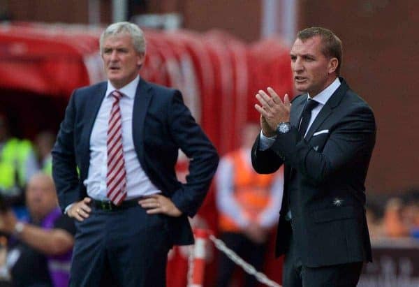 STOKE-ON-TRENT, ENGLAND - Sunday, August 9, 2015: Liverpool's manager Brendan Rodgers and Stoke City's manager Mark Hughes during the Premier League match at the Britannia Stadium. (Pic by David Rawcliffe/Propaganda)