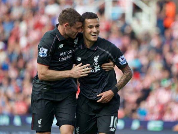 STOKE-ON-TRENT, ENGLAND - Sunday, August 9, 2015: Liverpool's Philippe Coutinho Correia celebrates scoring the first goal against Stoke Citywith team-mate James Milner during the Premier League match at the Britannia Stadium. (Pic by David Rawcliffe/Propaganda)