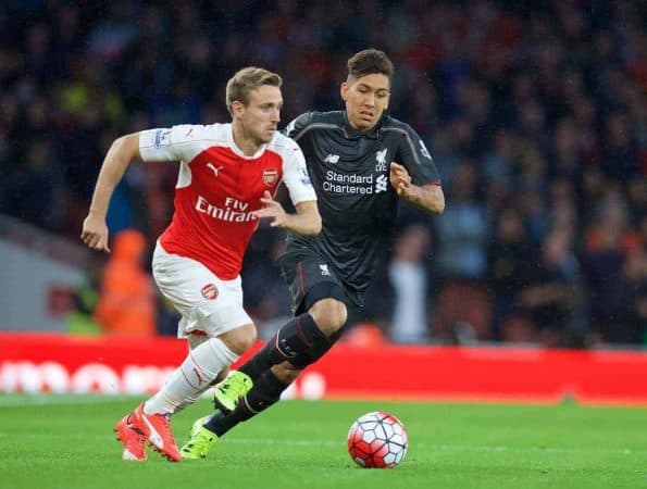 LONDON, ENGLAND - Monday, August 24, 2015: Liverpool's Roberto Firmino in action against Arsenal's Nacho Monreal during the Premier League match at the Emirates Stadium. (Pic by David Rawcliffe/Propaganda)