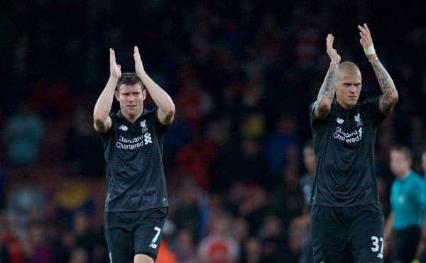 LONDON, ENGLAND - Monday, August 24, 2015: Liverpool's James Milner and Martin Skrtel applaud the travelling supporters after the goal-less draw against Arsenal during the Premier League match at the Emirates Stadium. (Pic by David Rawcliffe/Propaganda)