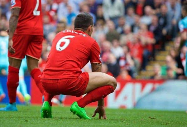 LIVERPOOL, ENGLAND - Saturday, August 29, 2015: Liverpool's Dejan Lovren looks dejected after his mistake led to West Ham United's second goal during the Premier League match at Anfield. (Pic by David Rawcliffe/Propaganda)