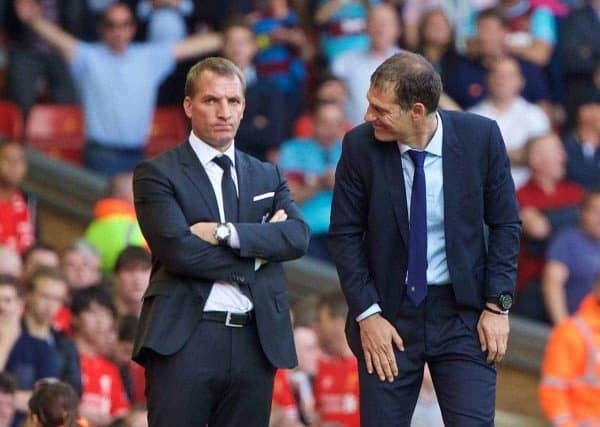 LIVERPOOL, ENGLAND - Saturday, August 29, 2015: West Ham United's manager Slaven Bilic and Liverpool's manager Brendan Rodgers during the Premier League match at Anfield. (Pic by David Rawcliffe/Propaganda)