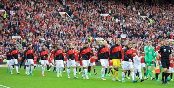 MANCHESTER, ENGLAND - Saturday, September 12, 2015: Liverpool's captain James Milner leads his side out to face Manchester United during the Premier League match at Old Trafford. (Pic by David Rawcliffe/Propaganda)