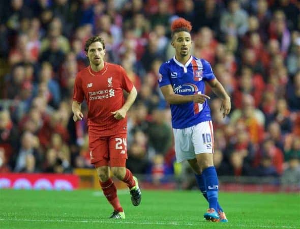 LIVERPOOL, ENGLAND - Wednesday, September 23, 2015: Liverpool's Joe Allen in action against Carlisle United's Bastien Hery during the Football League Cup 3rd Round match at Anfield. (Pic by David Rawcliffe/Propaganda)