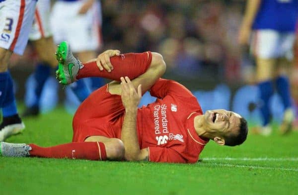 LIVERPOOL, ENGLAND - Wednesday, September 23, 2015: Liverpool's Dejan Lovren goes down with an injury during the Football League Cup 3rd Round match against Carlisle United at Anfield. (Pic by David Rawcliffe/Propaganda)