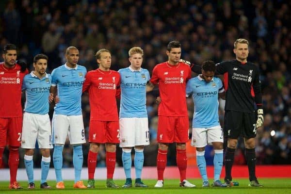 MANCHESTER, ENGLAND - Saturday, November 21, 2015: Liverpool's and Manchester City players stand during the French national anthem before the Premier League match at the City of Manchester Stadium. (Pic by David Rawcliffe/Propaganda)