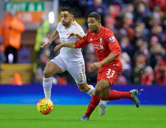 LIVERPOOL, ENGLAND - Sunday, November 29, 2015: Liverpool's Jordon Ibe in action against Swansea City's Neil Taylor during the Premier League match at Anfield. (Pic by David Rawcliffe/Propaganda)