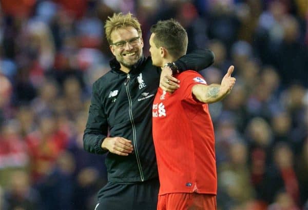 LIVERPOOL, ENGLAND - Boxing Day, Saturday, December 26, 2015: Liverpool's manager Jürgen Klopp celebrates the 1-0 victory over Leicester City with Dejan Lovren during the Premier League match at Anfield. (Pic by David Rawcliffe/Propaganda)