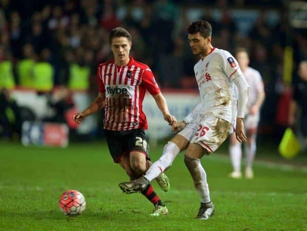 EXETER, ENGLAND - Friday, January 8, 2016: Liverpool's Tiago Ilori in action against Exeter City's Tom Nichols during the FA Cup 3rd Round match at St. James Park. (Pic by David Rawcliffe/Propaganda)