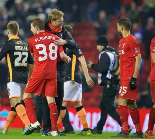 LIVERPOOL, ENGLAND - Wednesday, January 20, 2016: Liverpool's manager Jürgen Klopp hugs Jon Flanagan after the 3-0 victory over Exeter City during the FA Cup 3rd Round Replay match at Anfield. (Pic by David Rawcliffe/Propaganda)