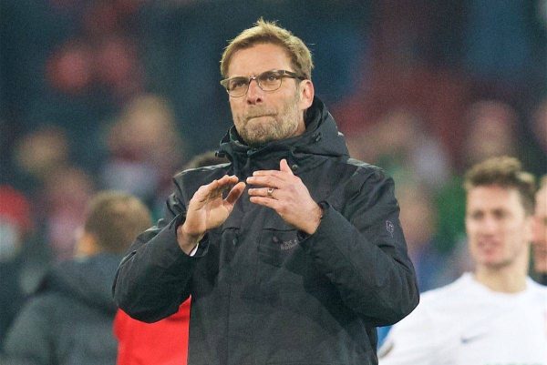 AUGSBURG, GERMANY - Thursday, February 18, 2016: Liverpool's manager Jürgen Klopp applauds the travelling supporters after the goal-less draw against FC Augsburg during the UEFA Europa League Round of 32 1st Leg match at the Augsburg Arena. (Pic by David Rawcliffe/Propaganda)