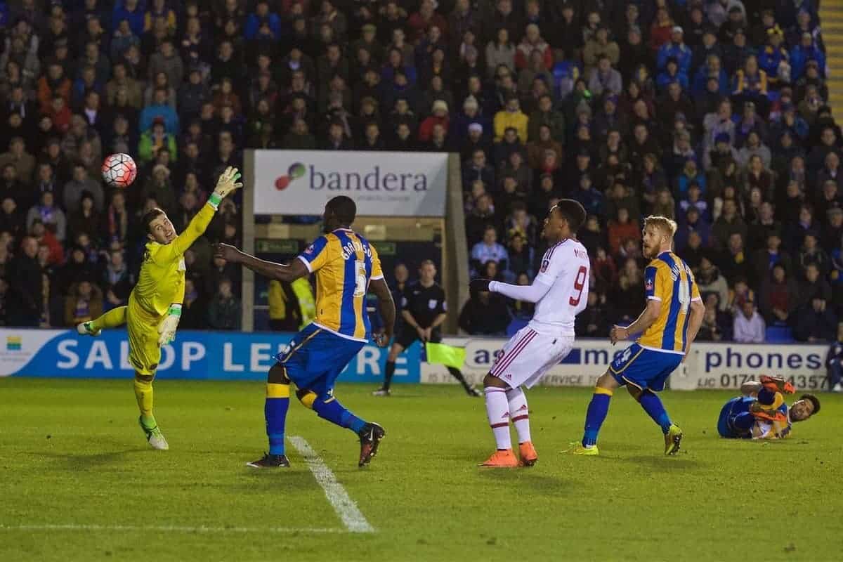 SHREWSBURY, ENGLAND - Monday, February 22, 2016: Manchester United's Chris Smalling scores the first goal against Shrewsbury Town's goalkeeper Jayson Leutwiler during the FA Cup 5th Round match at The New Meadow. (Pic by David Rawcliffe/Propaganda)