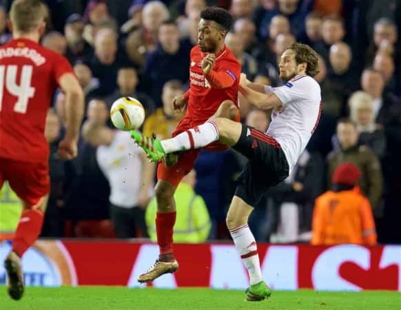 LIVERPOOL, ENGLAND - Thursday, March 10, 2016: Liverpool's Daniel Sturridge in action against Manchester United's Daley Blind during the UEFA Europa League Round of 16 1st Leg match at Anfield. (Pic by David Rawcliffe/Propaganda)