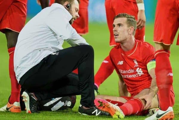 DORTMUND, GERMANY - Thursday, April 7, 2016: Liverpool's captain Jordan Henderson is treated by physiotherapist Chris Morgan for an injury during the UEFA Europa League Quarter-Final 1st Leg match against Borussia Dortmund at Westfalenstadion. (Pic by David Rawcliffe/Propaganda)