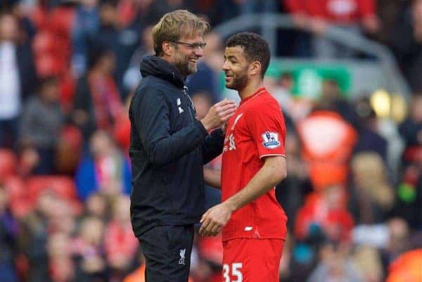 LIVERPOOL, ENGLAND - Sunday, April 10, 2016: Liverpool's manager Jürgen Klopp hugs Kevin Stewart after the 4-1 victory over Stoke City during the Premier League match at Anfield. (Pic by David Rawcliffe/Propaganda)