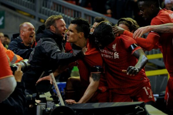 LIVERPOOL, ENGLAND - Thursday, April 14, 2016: Liverpool's Dejan Lovren celebrates scoring the dramatic fourth goal against Borussia Dortmund in injury time to seal a 4-3 (5-4 aggregate) victory during the UEFA Europa League Quarter-Final 2nd Leg match at Anfield. (Pic by David Rawcliffe/Propaganda)