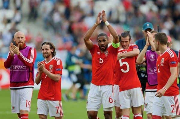 BORDEAUX, FRANCE - Saturday, June 11, 2016: Wales' James Collins, Joe Allen, captain Ashley Williams and Gareth Bale celebrate their side's 2-1 victory over Slovakia during the UEFA Euro 2016 Championship at Stade de Bordeaux. (Pic by David Rawcliffe/Propaganda)