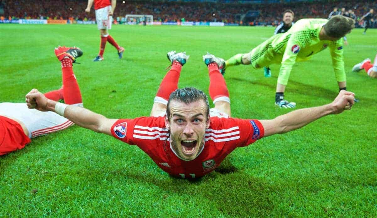 LILLE, FRANCE - Friday, July 1, 2016: Wales' Gareth Bale slides on the pitch as he celebrates a 3-1 victory over Belgium and reaching the Semi-Final during the UEFA Euro 2016 Championship Quarter-Final match at the Stade Pierre Mauroy. (Pic by David Rawcliffe/Propaganda)