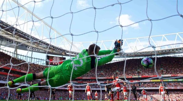 LONDON, ENGLAND - Sunday, August 14, 2016: Liverpool's goalkeeper Simon Mignolet saves a penalty from Arsenal's Theo Walcott during the FA Premier League match at the Emirates Stadium. (Pic by David Rawcliffe/Propaganda)