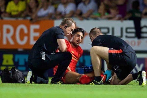 BURTON-UPON-TRENT, ENGLAND - Tuesday, August 23, 2016: Liverpool's Emre Can is treated for an injury during the Football League Cup 2nd Round match against Burton Albion at the Pirelli Stadium. (Pic by David Rawcliffe/Propaganda)