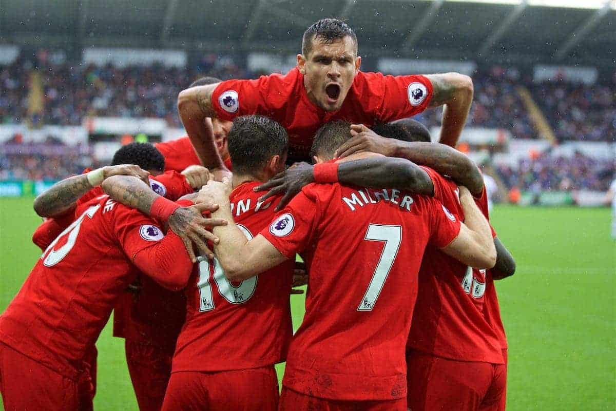 LIVERPOOL, ENGLAND - Saturday, October 1, 2016: Liverpool's Dejan Lovren jumps on the huddle as James Milner celebrates scoring the second goal against Swansea City from the penalty spot to make the score 2-1 during the FA Premier League match at the Liberty Stadium. (Pic by David Rawcliffe/Propaganda)