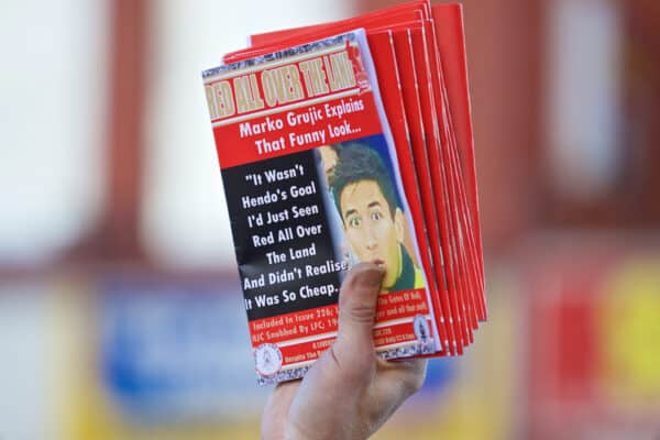 LIVERPOOL, ENGLAND - Saturday, October 22, 2016: A Liverpool supporter selling a fanzine "Red All Over The Land" before the FA Premier League match against West Bromwich Albion at Anfield. (Pic by David Rawcliffe/Propaganda)