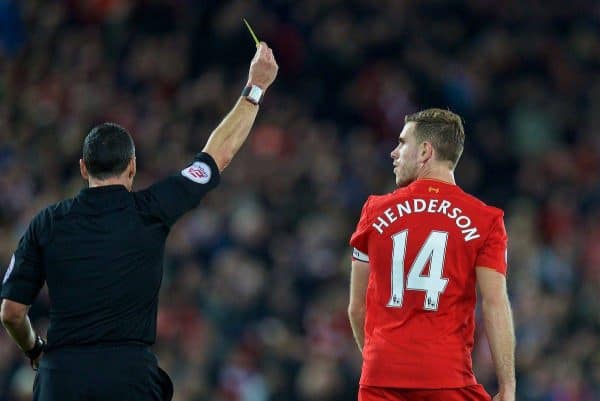 LIVERPOOL, ENGLAND - Saturday, October 22, 2016: Liverpool's captain Jordan Henderson is shown a yellow card by referee Neil Swarbrick during the FA Premier League match against West Bromwich Albion at Anfield. (Pic by David Rawcliffe/Propaganda)