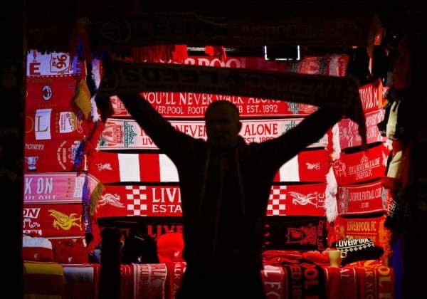 LIVERPOOL, ENGLAND - Tuesday, November 29, 2016: A Liverpool supporter buys a souvenir scarf outside Anfield ahead of the Football League Cup Quarter-Final match between Liverpool and Leeds United. (Pic by David Rawcliffe/Propaganda)