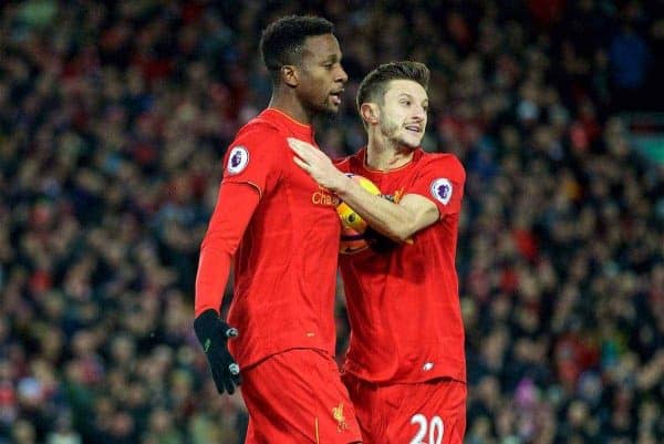 LIVERPOOL, ENGLAND - Sunday, December 11, 2016: Liverpool's Divock Origi scores the second goal against West Ham United with team-mate Adam Lallana to make the score 2-2 during the FA Premier League match at Anfield. (Pic by David Rawcliffe/Propaganda)