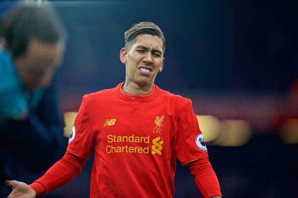 LIVERPOOL, ENGLAND - Saturday, January 21, 2017: Liverpool's Roberto Firmino looks dejected as his side lose 3-2 to Swansea City during the FA Premier League match at Anfield. (Pic by David Rawcliffe/Propaganda)
