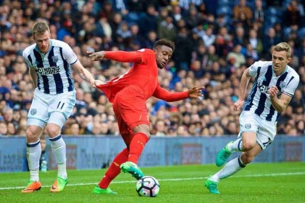 WEST BROMWICH, ENGLAND - Easter Sunday, April 16, 2017, 2016: Liverpool's Divock Origi has his shirt pulled by West Bromwich Albion's Chris Brunt during the FA Premier League match at the Hawthorns. (Pic by David Rawcliffe/Propaganda)