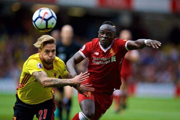 WATFORD, ENGLAND - Saturday, August 12, 2017: Liverpool's Sadio Mane and Watford's Kiko Femenía during the FA Premier League match between Watford and Liverpool at Vicarage Road. (Pic by David Rawcliffe/Propaganda)