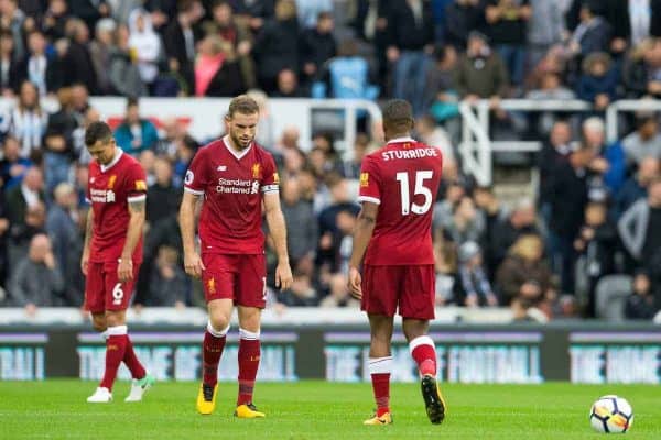 NEWCASTLE-UPON-TYNE, ENGLAND - Sunday, October 1, 2017: Liverpool's players look dejected after conceding the equalising goal to Newcastle United during the FA Premier League match between Newcastle United and Liverpool at St. James' Park. (Pic by Paul Greenwood/Propaganda) Dejan Lovren, captain Jordan Henderson, Daniel Sturridge