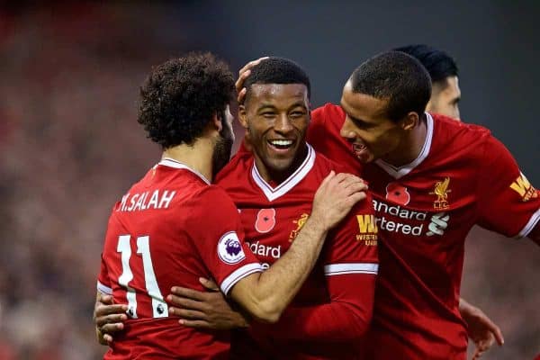 LIVERPOOL, ENGLAND - Saturday, October 28, 2017: Liverpool's Georginio Wijnaldum celebrates scoring the third goal with team-mate Mohamed Salah [L] and Joel Matip [R] during the FA Premier League match between Liverpool and Huddersfield Town at Anfield. (Pic by David Rawcliffe/Propaganda)