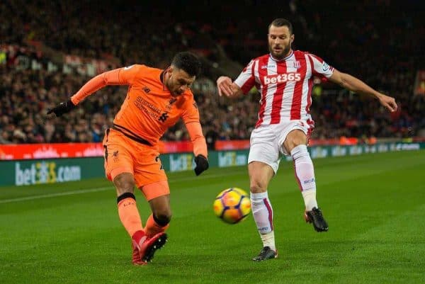 STOKE-ON-TRENT, ENGLAND - Wednesday, November 29, 2017: Liverpoolís Alex Oxlade-Chamberlain (L) in action with Stoke Cityís Erik Pieters (R) during the FA Premier League match between Stoke City and Liverpool at the Bet365 Stadium. (Pic by Peter Powell/Propaganda)