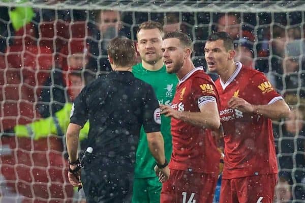 LIVERPOOL, ENGLAND - Sunday, December 10, 2017: Liverpool's goalkeeper Simon Mignolet, captain Jordan Henderson and Dejan Lovren remonstrate with referee Craig Pawson after a penalty is awarded to Everton which helps them seal an undeserved 1-1 draw during the FA Premier League match between Liverpool and Everton, the 229th Merseyside Derby, at Anfield. (Pic by David Rawcliffe/Propaganda)