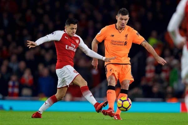 LONDON, ENGLAND - Friday, December 22, 2017: Liverpool's Dejan Lovren and Arsenal's Alexis Sanchez during the FA Premier League match between Arsenal and Liverpool at the Emirates Stadium. (Pic by David Rawcliffe/Propaganda)