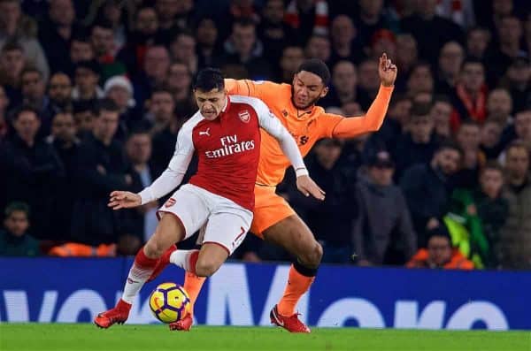 LONDON, ENGLAND - Friday, December 22, 2017: Liverpool's Joe Gomez and Arsenal's Alexis Sanchez during the FA Premier League match between Arsenal and Liverpool at the Emirates Stadium. (Pic by David Rawcliffe/Propaganda)