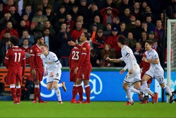 SWANSEA, WALES - Monday, January 22, 2018: Swansea City's Alfie Mawson celebrates scoring the first goal during the FA Premier League match between Swansea City FC and Liverpool FC at the Liberty Stadium. (Pic by David Rawcliffe/Propaganda)