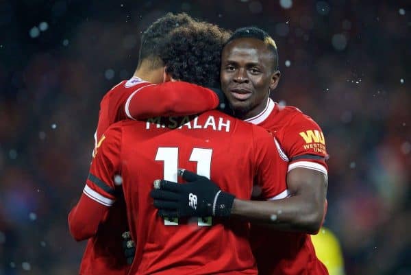 LIVERPOOL, ENGLAND - Saturday, March 17, 2018: Liverpool's Mohamed Salah celebrates scoring the fourth goal, the third of his hat-trick, with team-mates Alex Oxlade-Chamberlain (left) and Sadio Mane (right) during the FA Premier League match between Liverpool FC and Watford FC at Anfield. (Pic by David Rawcliffe/Propaganda)