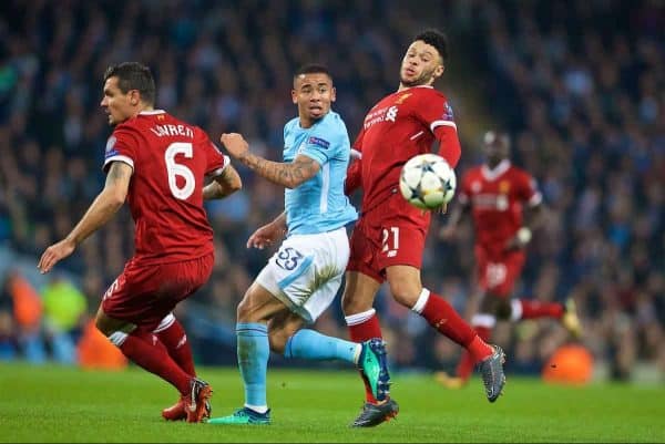 MANCHESTER, ENGLAND - Tuesday, April 10, 2018: Liverpool's Alex Oxlade-Chamberlain (right) and Manchester City's Gabriel Jesus (centre) during the UEFA Champions League Quarter-Final 2nd Leg match between Manchester City FC and Liverpool FC at the City of Manchester Stadium. (Pic by David Rawcliffe/Propaganda)